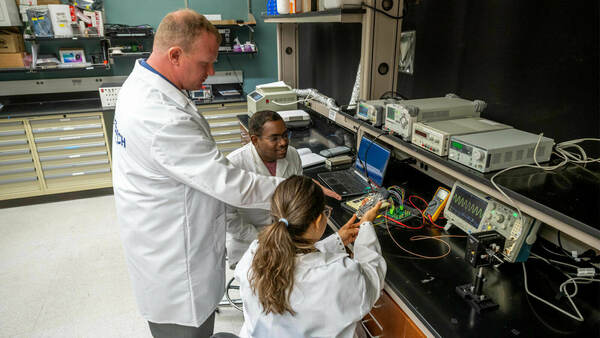 Professor Tom O Sullivan Working On Nearwave Technology With Graduate Students